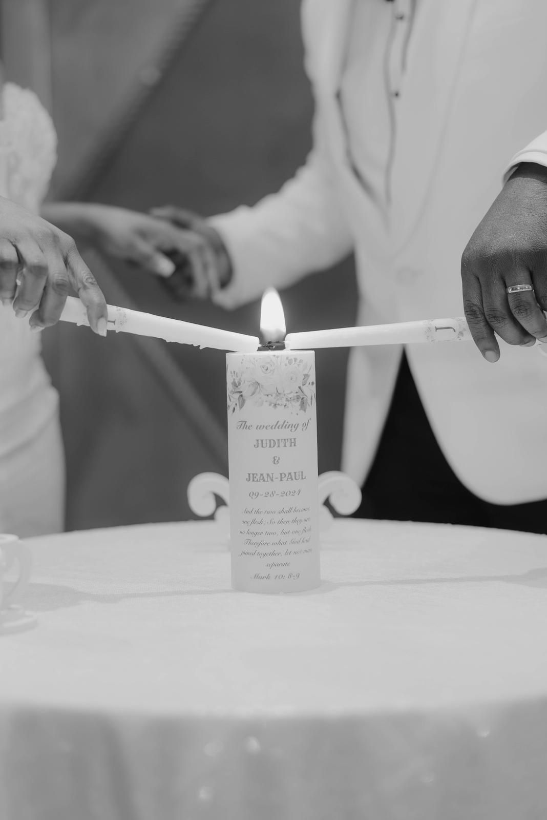 Black and white photograph of the unity candle lighting